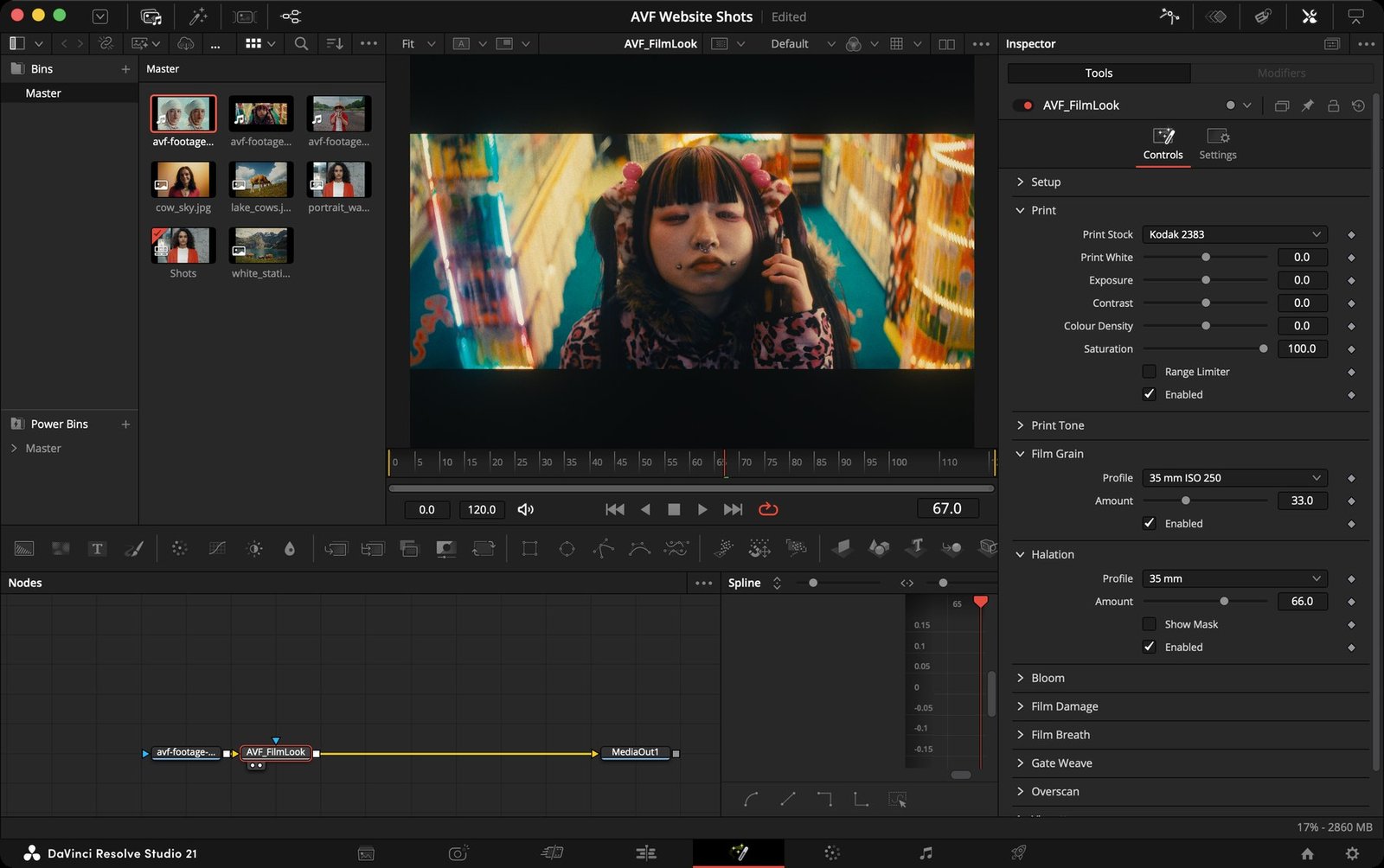 DaVinci Resolve Studio 21 with AVF FilmLook applied to a neon shop clip: Print, Film Grain and Halation controls